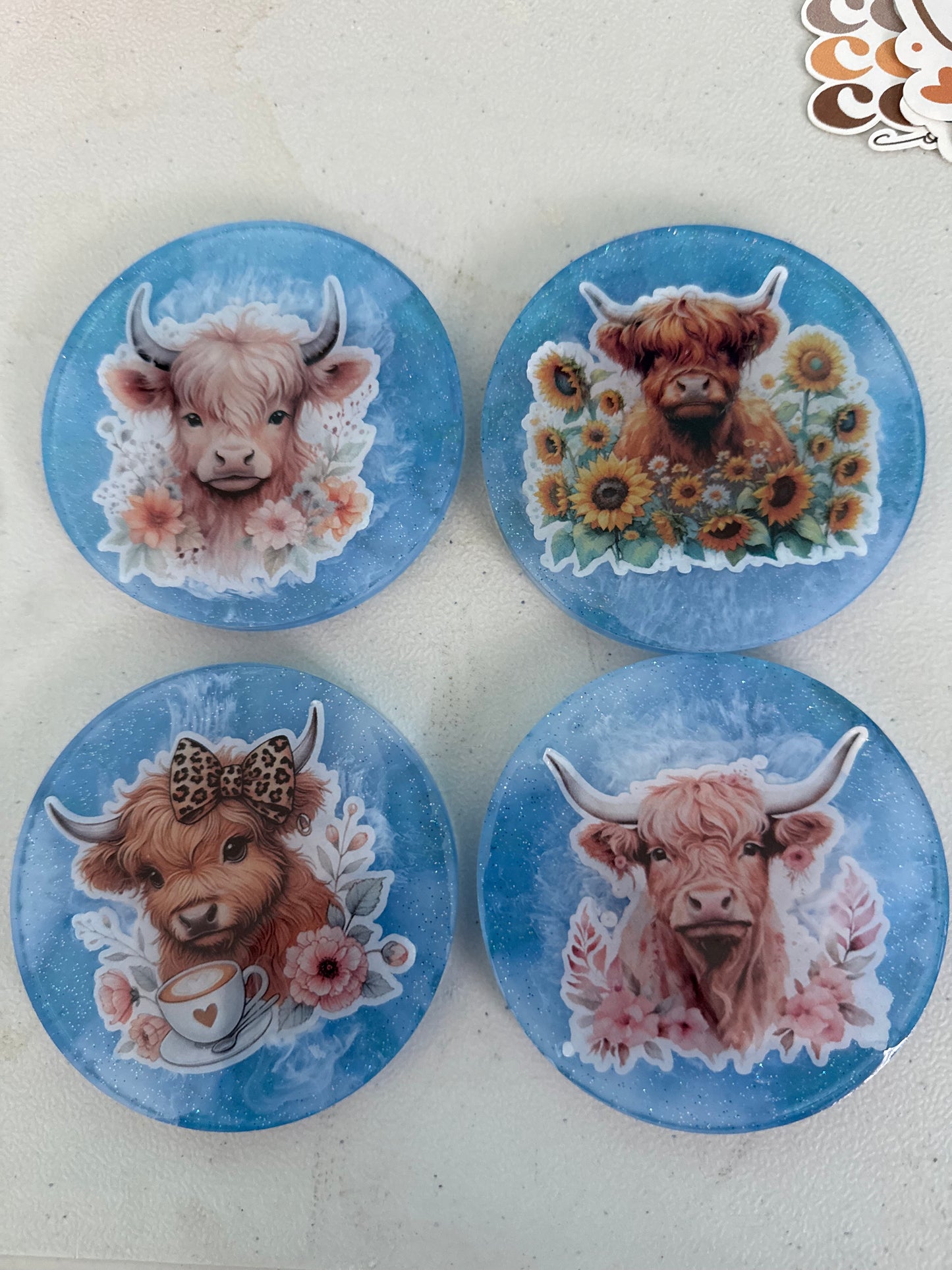 Highland Cow Coaster Set – 4 Unique Personalities in a Miniature Pasture Display